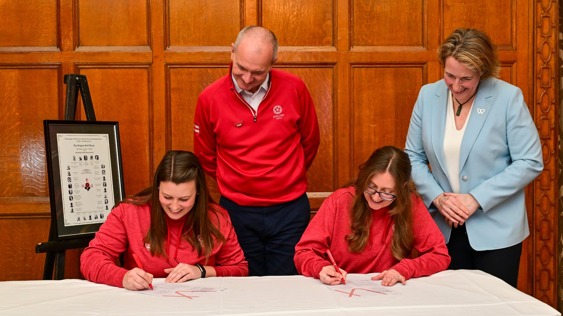 England Golf CEO Jeremy Tomlinson and IWG Secretary General Lisa O'Keefe shake hands after signing the Brighton Plus Helsinki Declaration